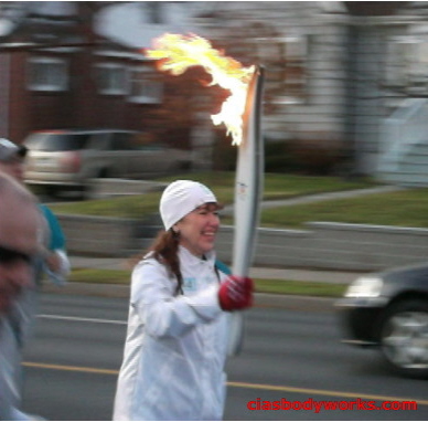 Olympic Torchbearer Cia Tweel running the Flame03